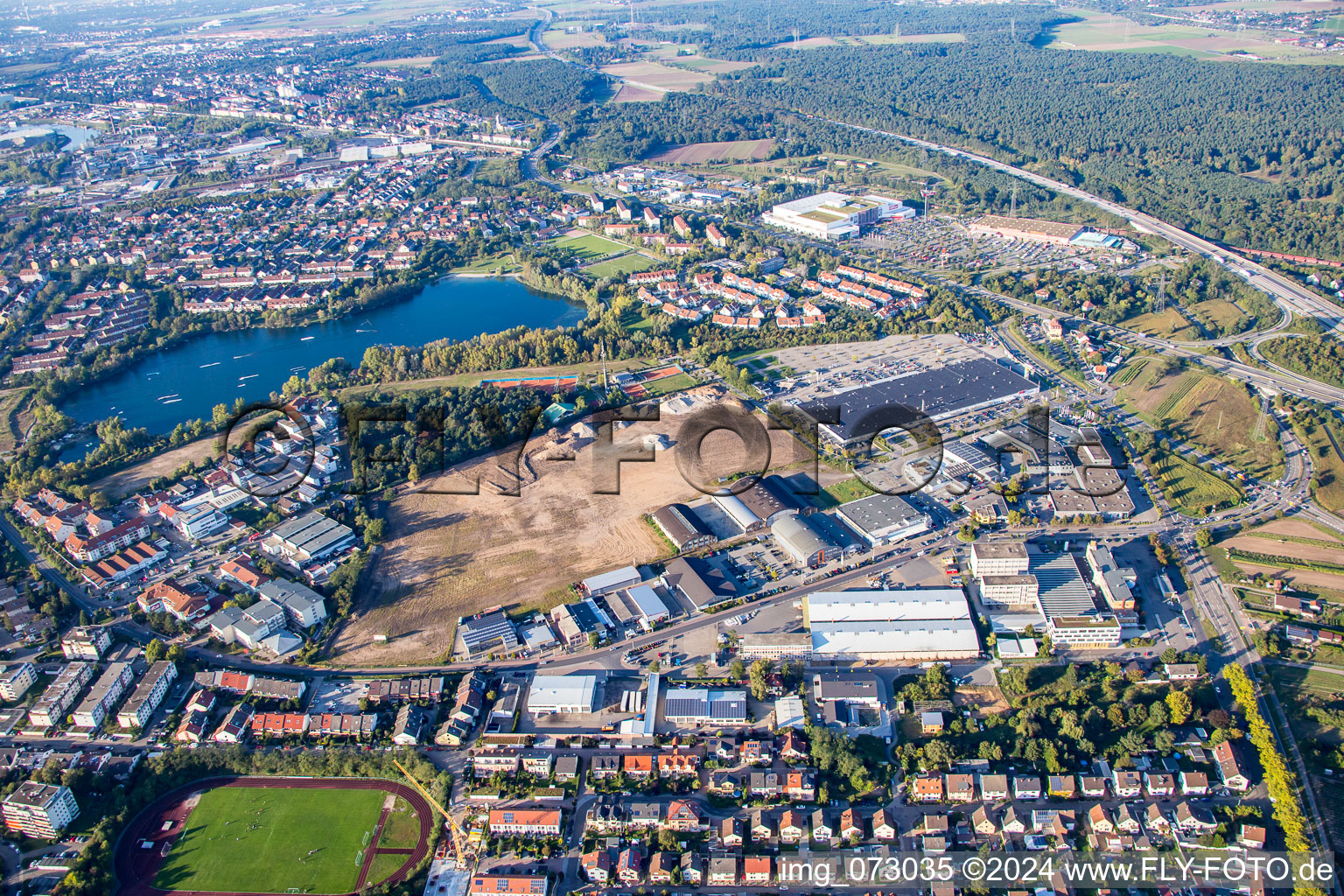 New building construction site in the industrial parkSchuette-Lanz-Park in Bruehl in the state Baden-Wurttemberg from the plane