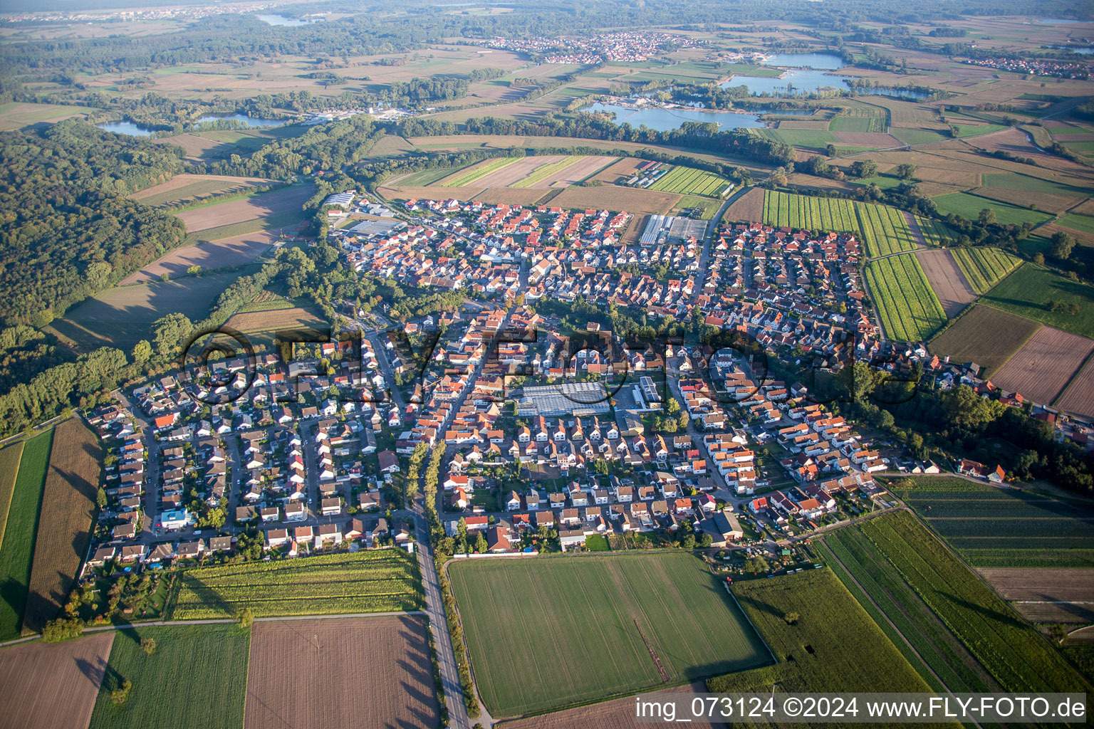 Village - view on the edge of agricultural fields and farmland in Kuhardt in the state Rhineland-Palatinate, Germany