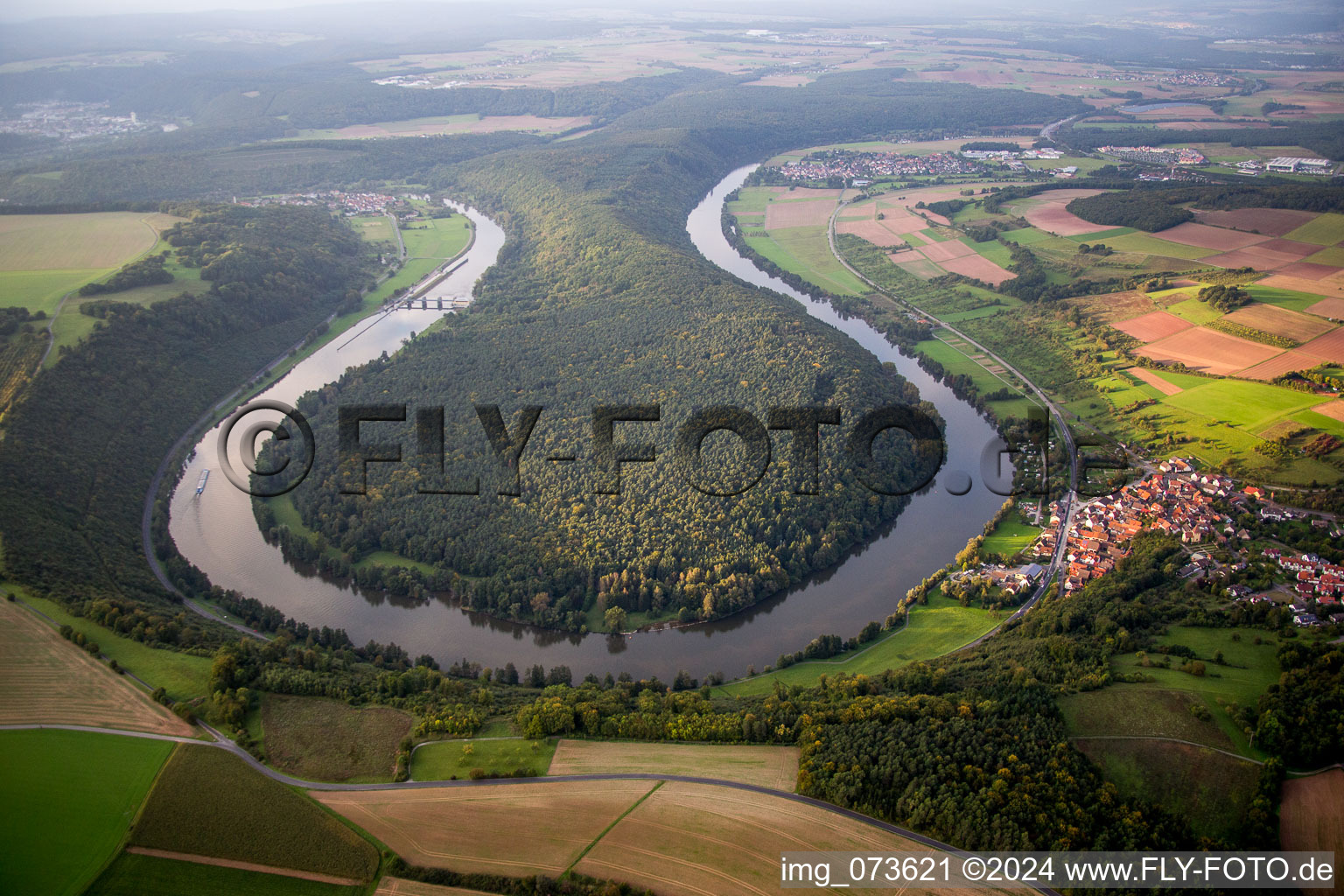 Curved loop of the riparian zones on the course of the river Main near Urphar in Kreuzwertheim in the state Bavaria