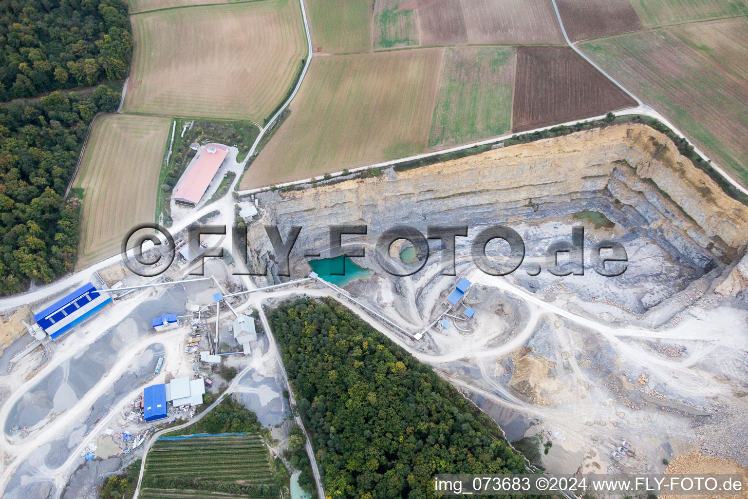 Quarry for the mining and handling of Gravel of Schraud Josef GmbH & Co. KG Schotterwerk in Retzstadt in the state Bavaria, Germany