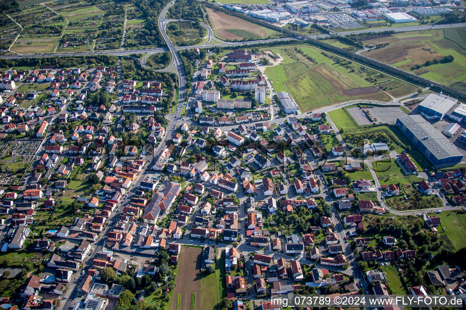 Aerial view of Town View of the streets and houses of the residential areas in Hallstadt in the state Bavaria, Germany