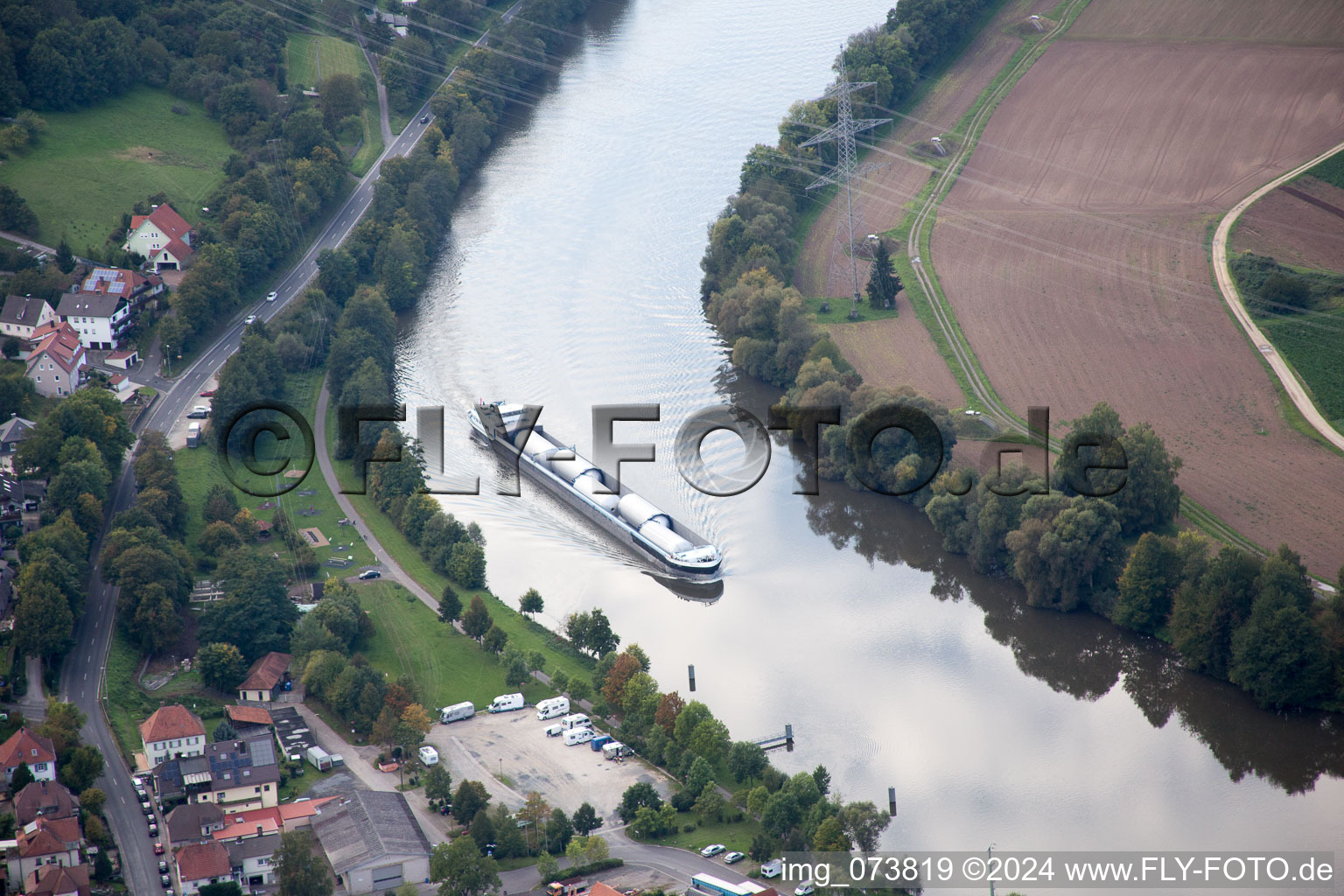 Ships and barge trains inland waterway transport in driving on the waterway of the river of the Main river in Eltmann in the state Bavaria