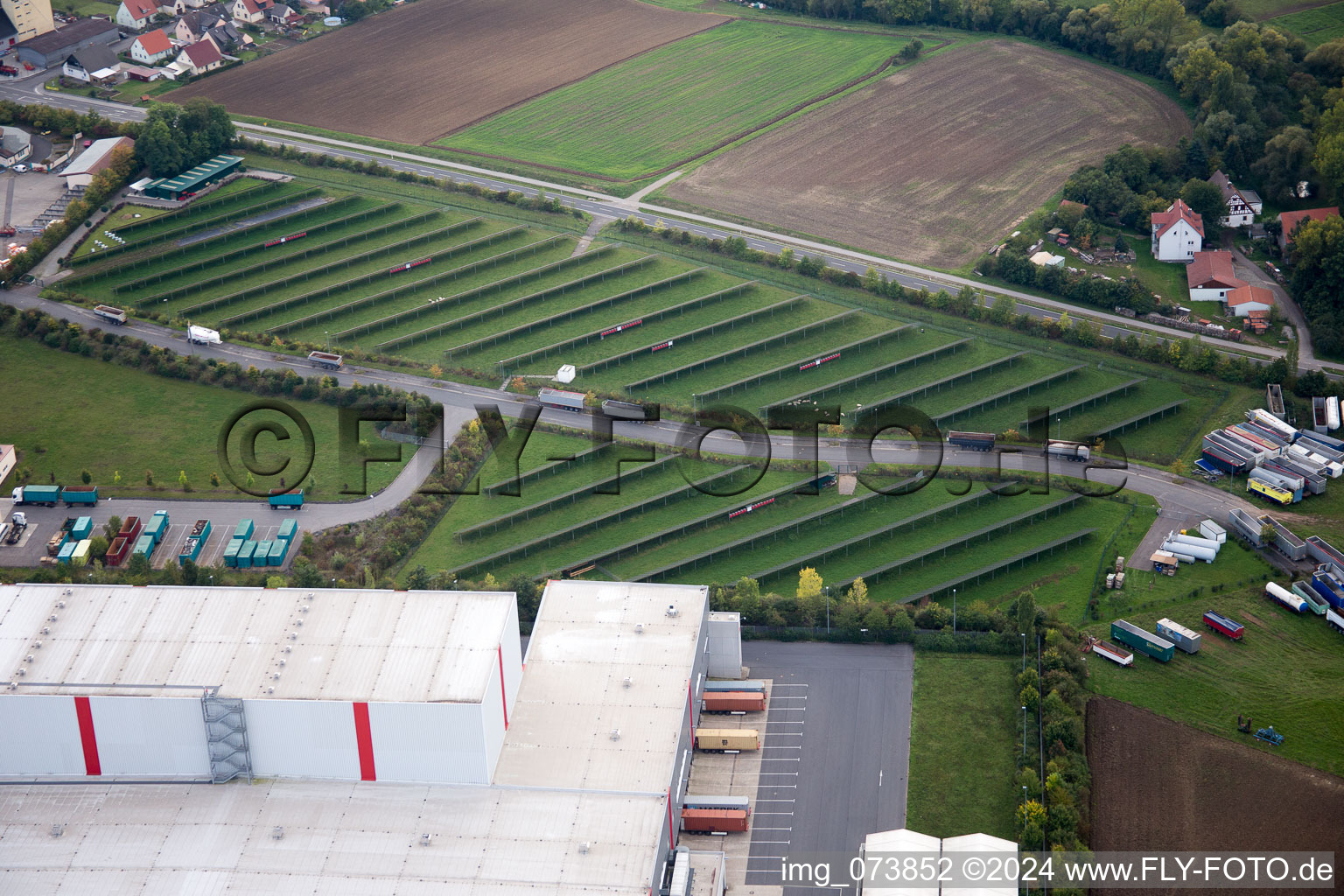 Aerial view of Industrial estate and company settlement Am Roedertor in Donnersdorf in the state Bavaria