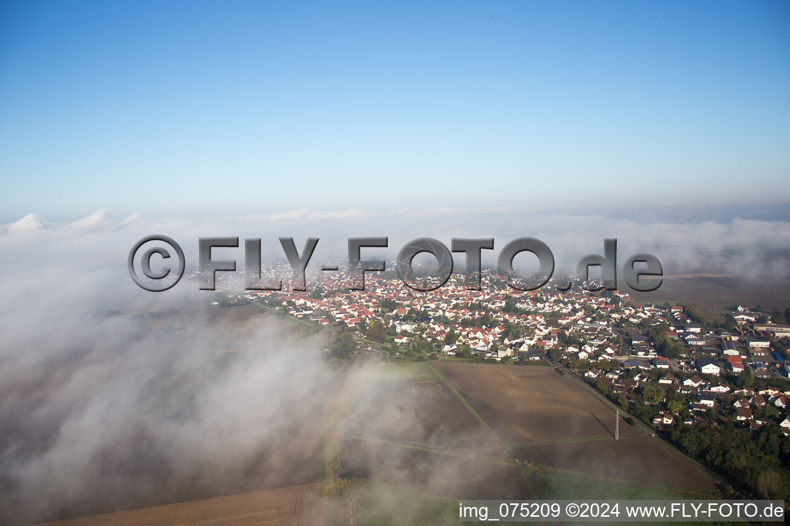 Under clouds in the district Hofheim in Lampertheim in the state Hesse, Germany