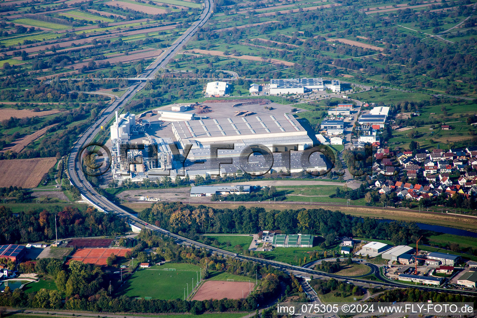 Aerial view of Building and production halls on the premises of Spanplattenfabirk Kronospan GmbH in Bischweier in the state Baden-Wurttemberg, Germany