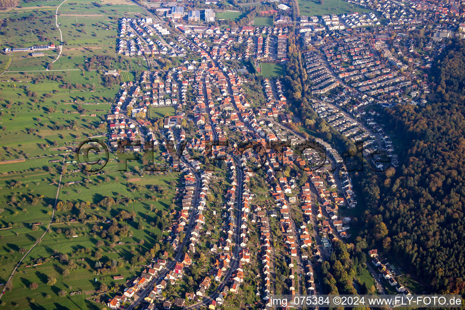 Village - view on the edge of agricultural fields and farmland in Busenbach in the state Baden-Wurttemberg, Germany