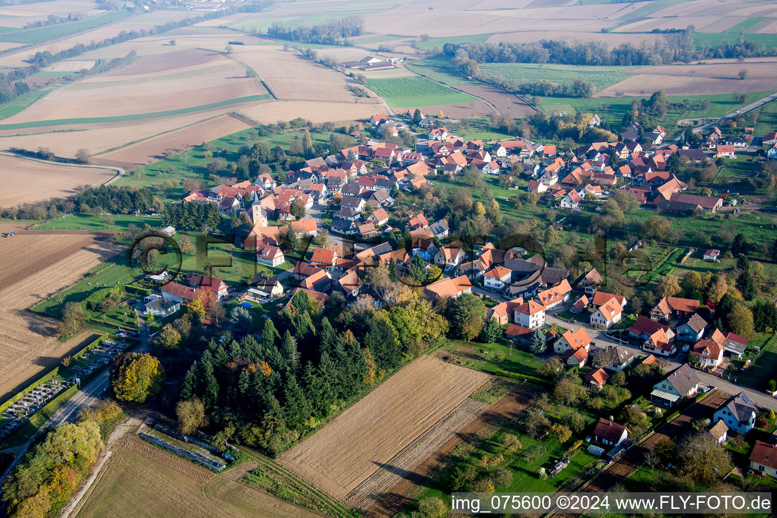 Village - view on the edge of agricultural fields and farmland in Soultz-sous-Forets in Grand Est, France