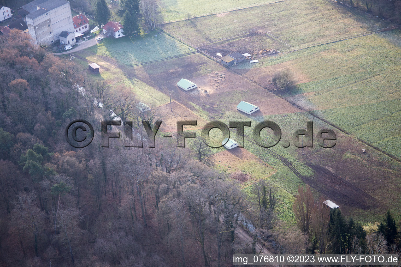 Oblique view of Otterbachtal, organic chicken farm at the Hahnmühle in Kandel in the state Rhineland-Palatinate, Germany