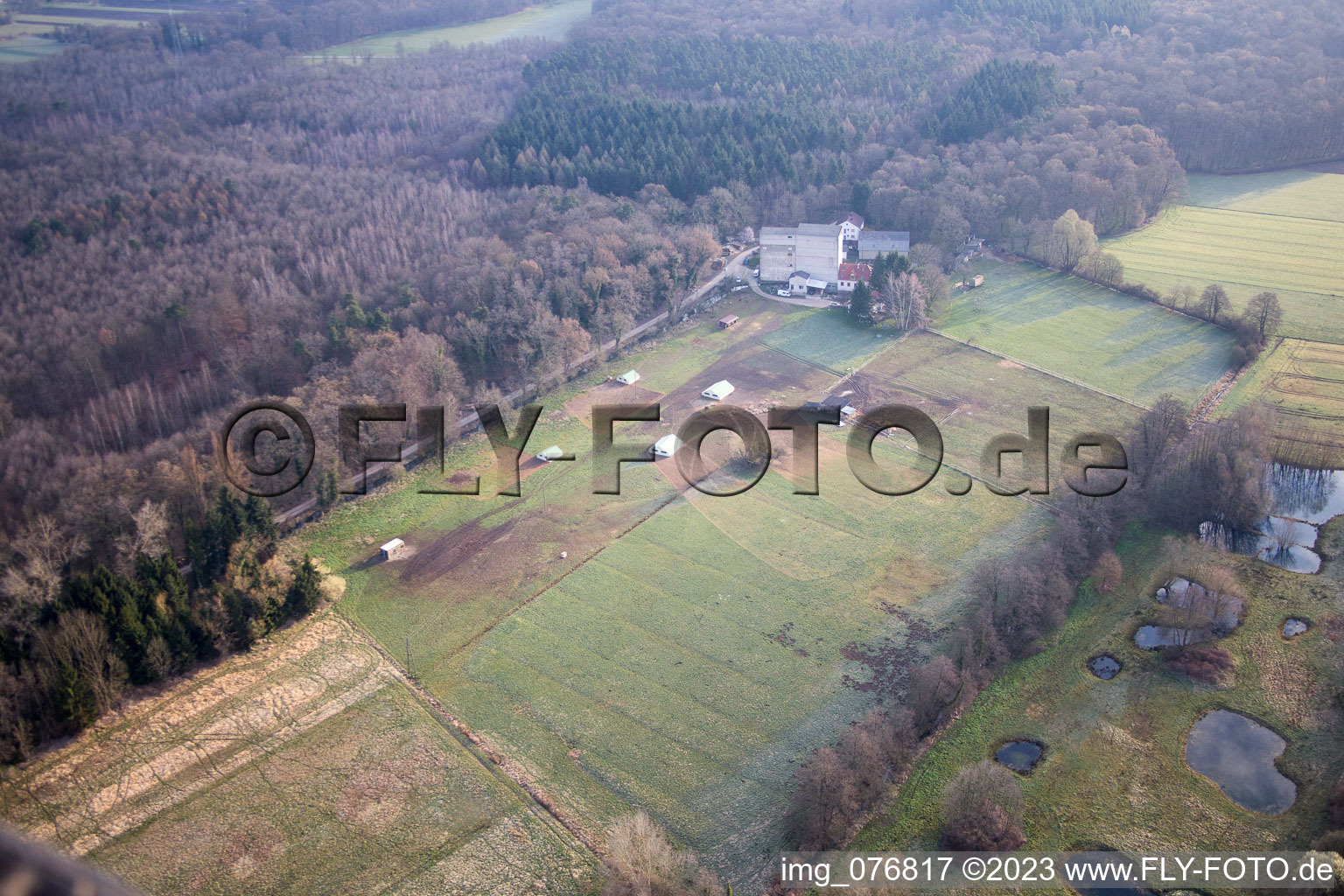 Drone recording of Otterbachtal, organic chicken farm at the Hahnmühle in Kandel in the state Rhineland-Palatinate, Germany
