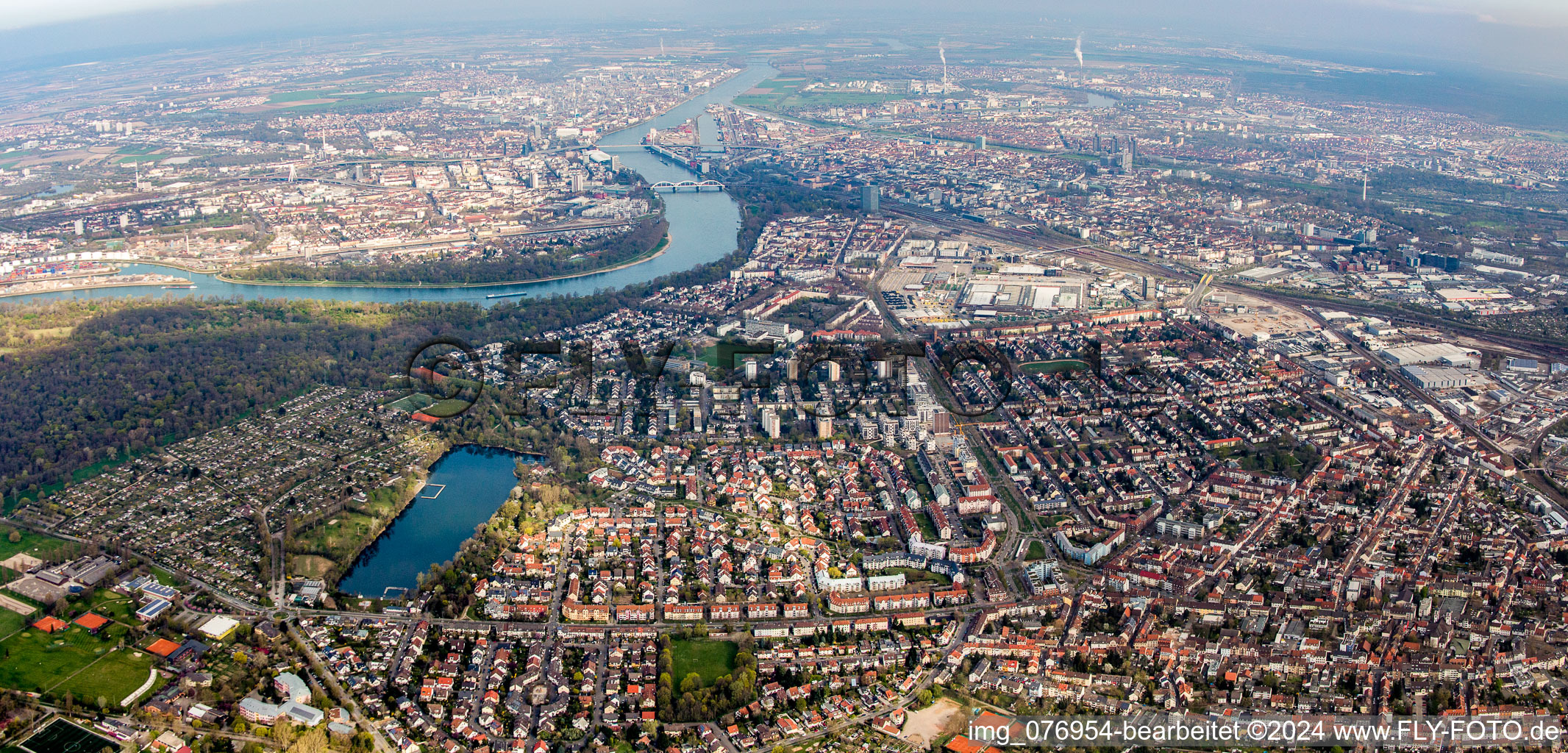 City view on the river bank of Rhein between Ludwigshafen and the district Lindenhof in Mannheim in the state Baden-Wurttemberg, Germany