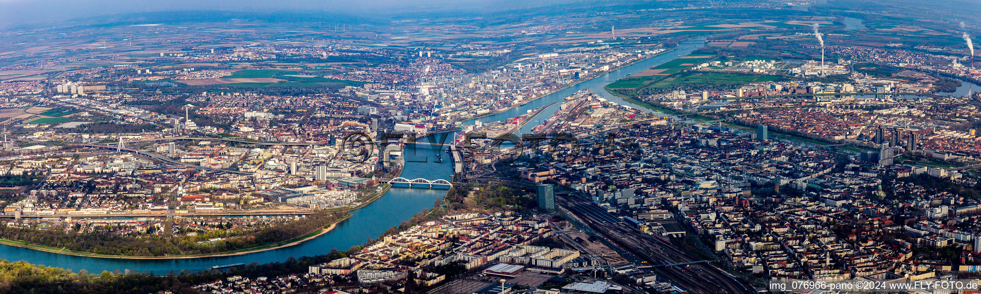 Panoramic perspective City view on the river bank of Rhine between Ludwigshafen and Mannheim in the state Baden-Wurttemberg, Germany