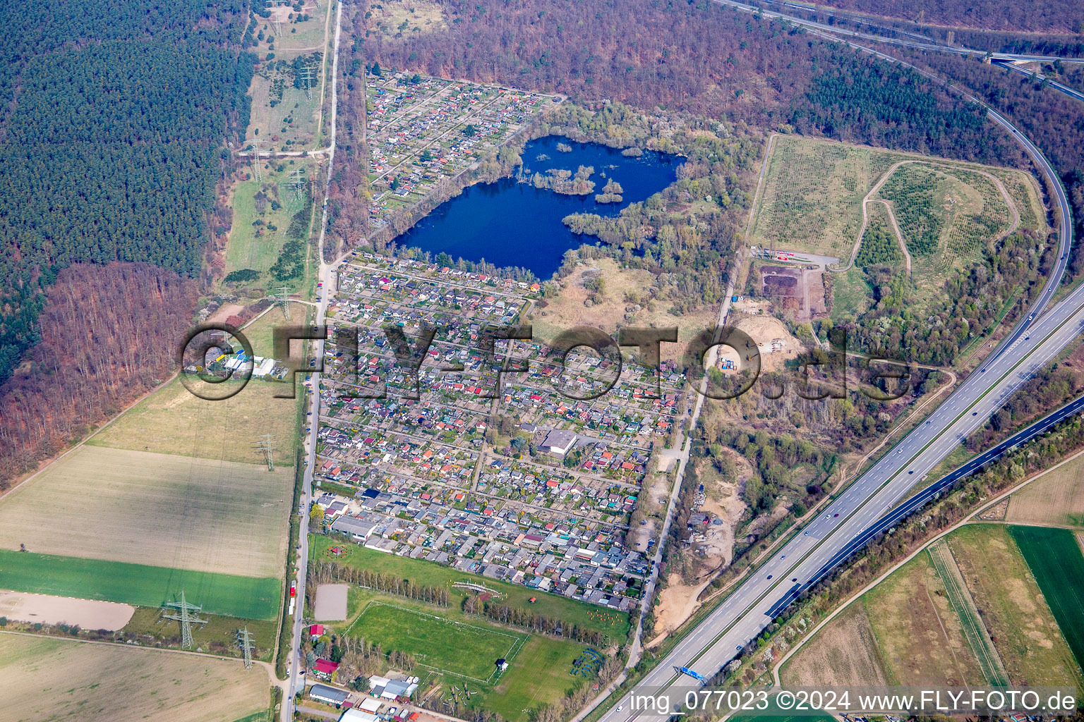 Village on the banks of lake Oberluecke in Viernheim in the state Hesse, Germany