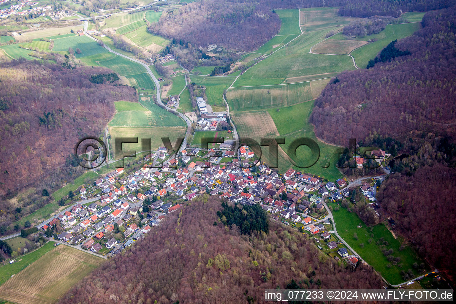 Village - view on the edge of agricultural fields and farmland in Waschenbach in the state Hesse, Germany