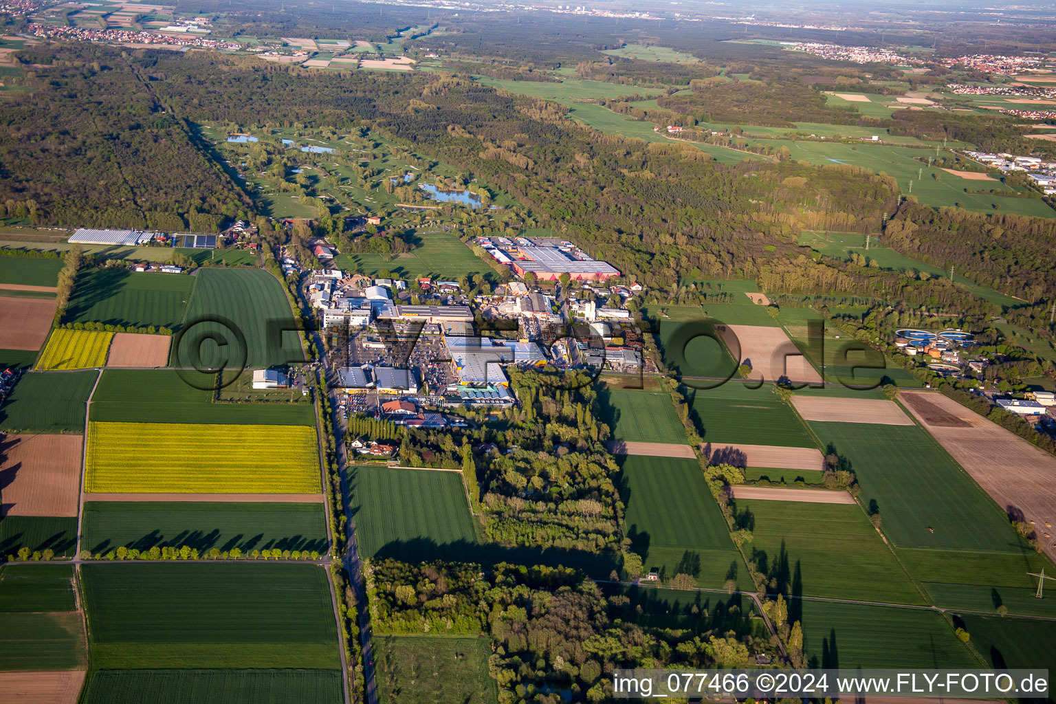 Bruchwiesenstrasse industrial area with Hornbach hardware store in front of golf club in Bornheim in the state Rhineland-Palatinate, Germany