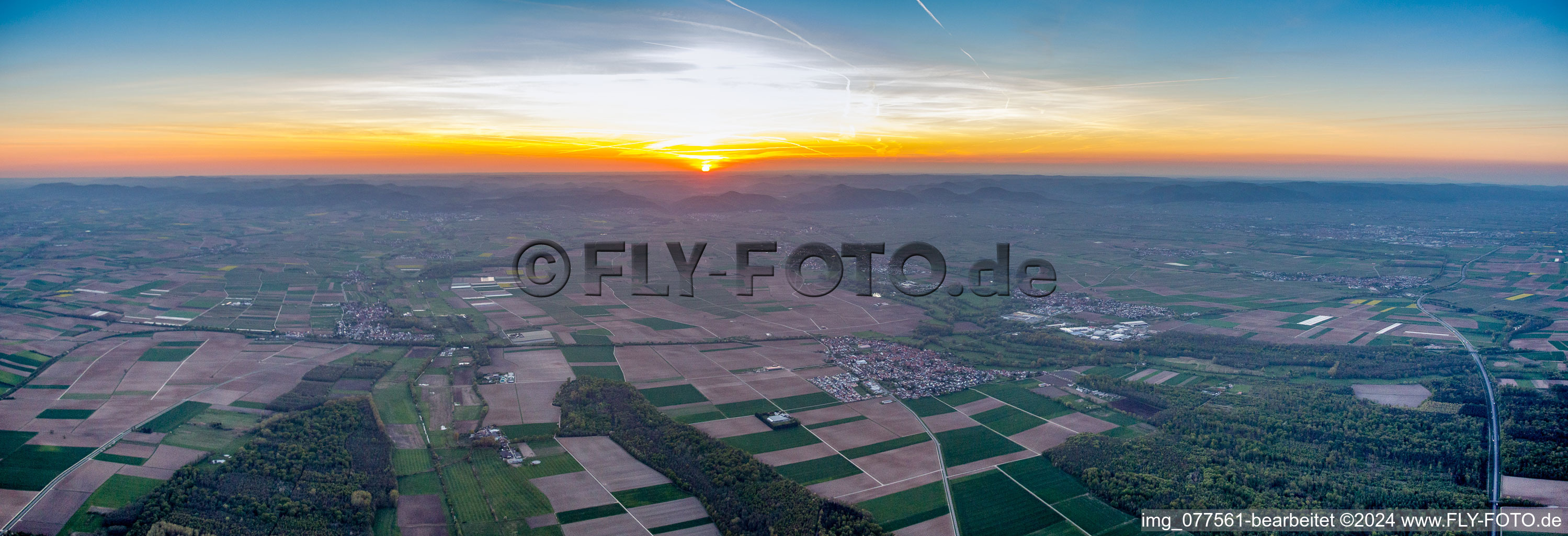 Sunset over the countryside of the Palatine Rhine valley in Steinweiler in the state Rhineland-Palatinate, Germany