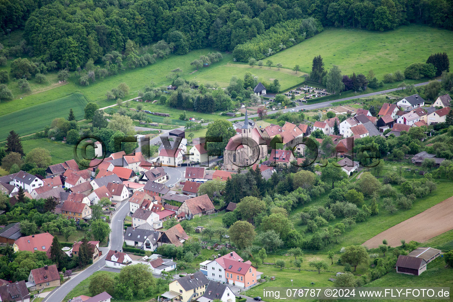 Aerial photograpy of Village - view on the edge of agricultural fields and farmland in the district Eckartshausen in Werneck in the state Bavaria