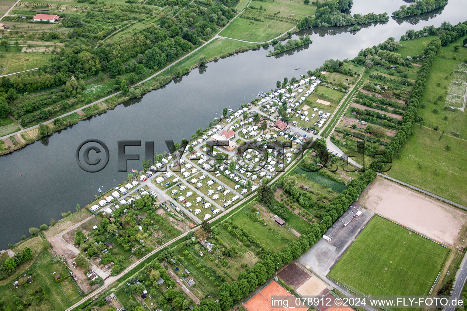 Camping Ankergrund with caravans and tents at the Main river in Volkach in the state , Germany