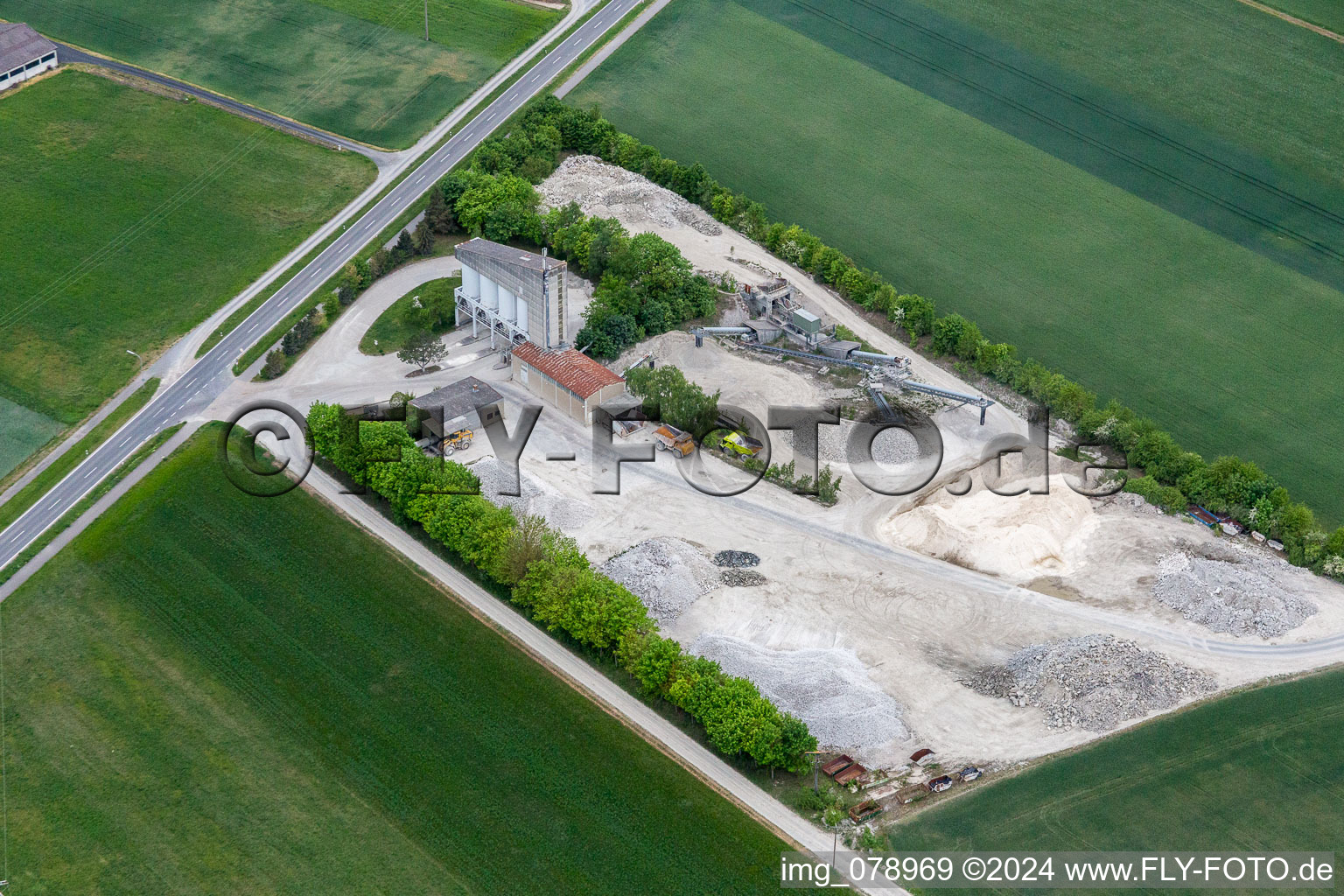 Site and tailings area of the gravel mining of Concrete-manufacturer in Sulzheim in the state Bavaria, Germany