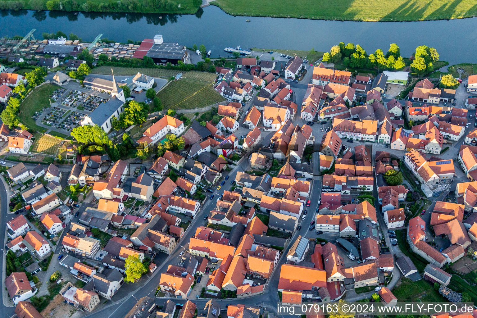 Aerial view of Village on the river bank areas of the Main river in Wipfeld in the state Bavaria, Germany