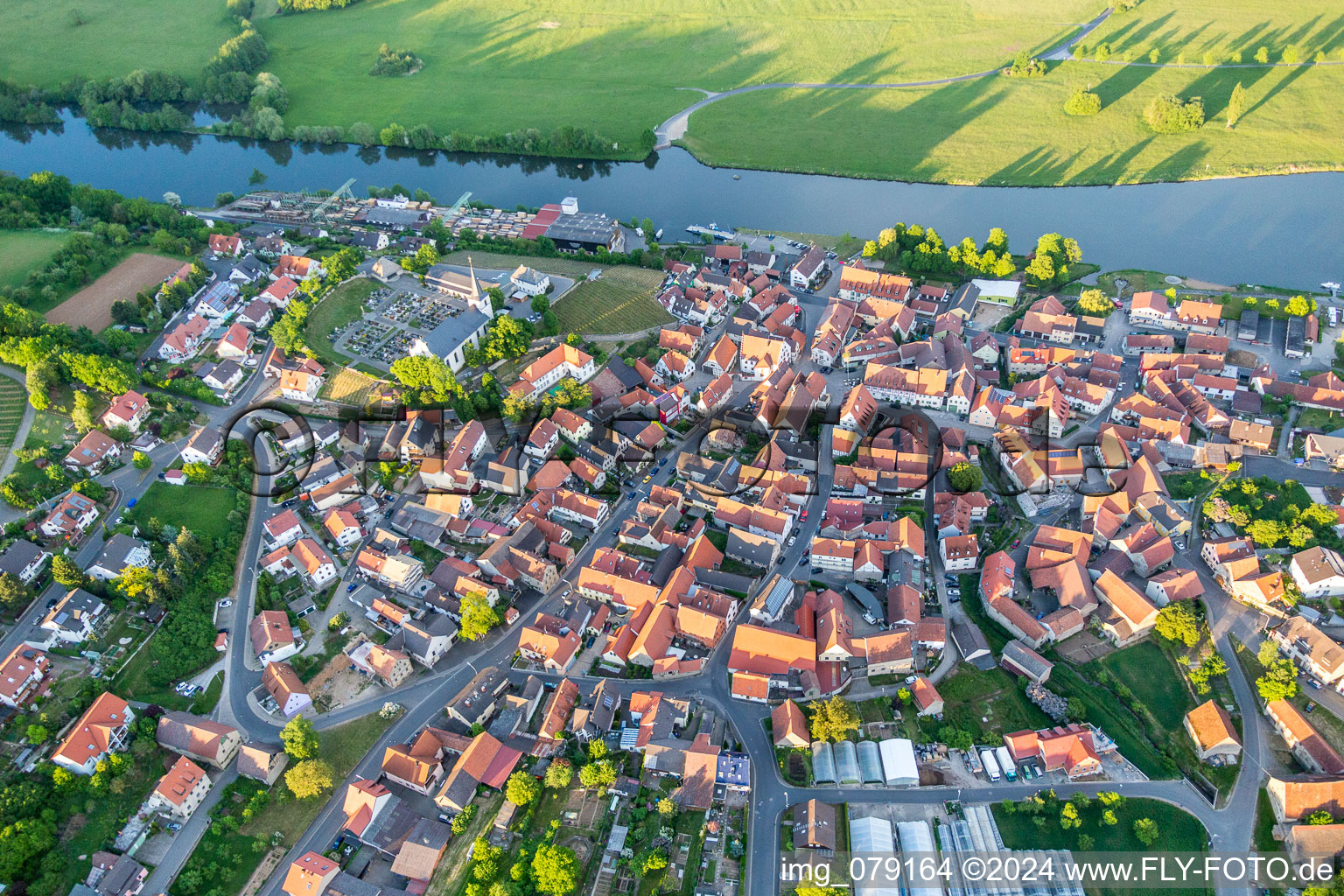 Aerial photograpy of Village on the river bank areas of the Main river in Wipfeld in the state Bavaria, Germany