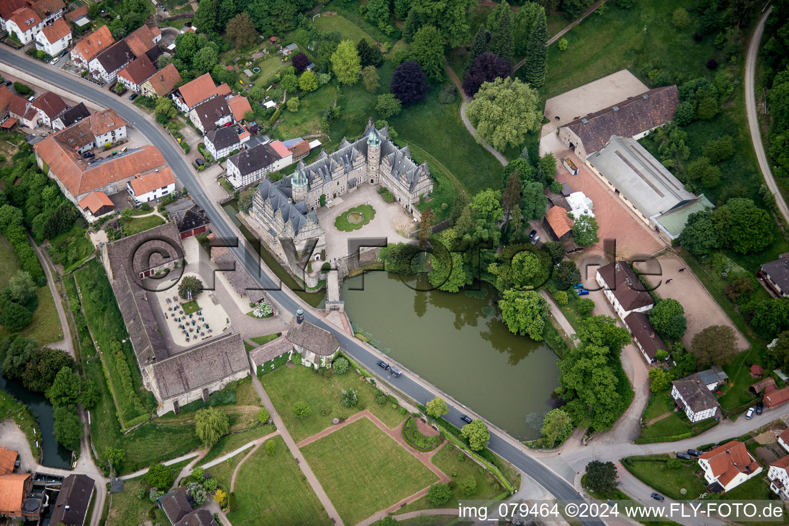 Aerial view of Building and castle park systems of water castle Schloss Haemelschenburg in the district Haemelschenburg in Emmerthal in the state Lower Saxony, Germany