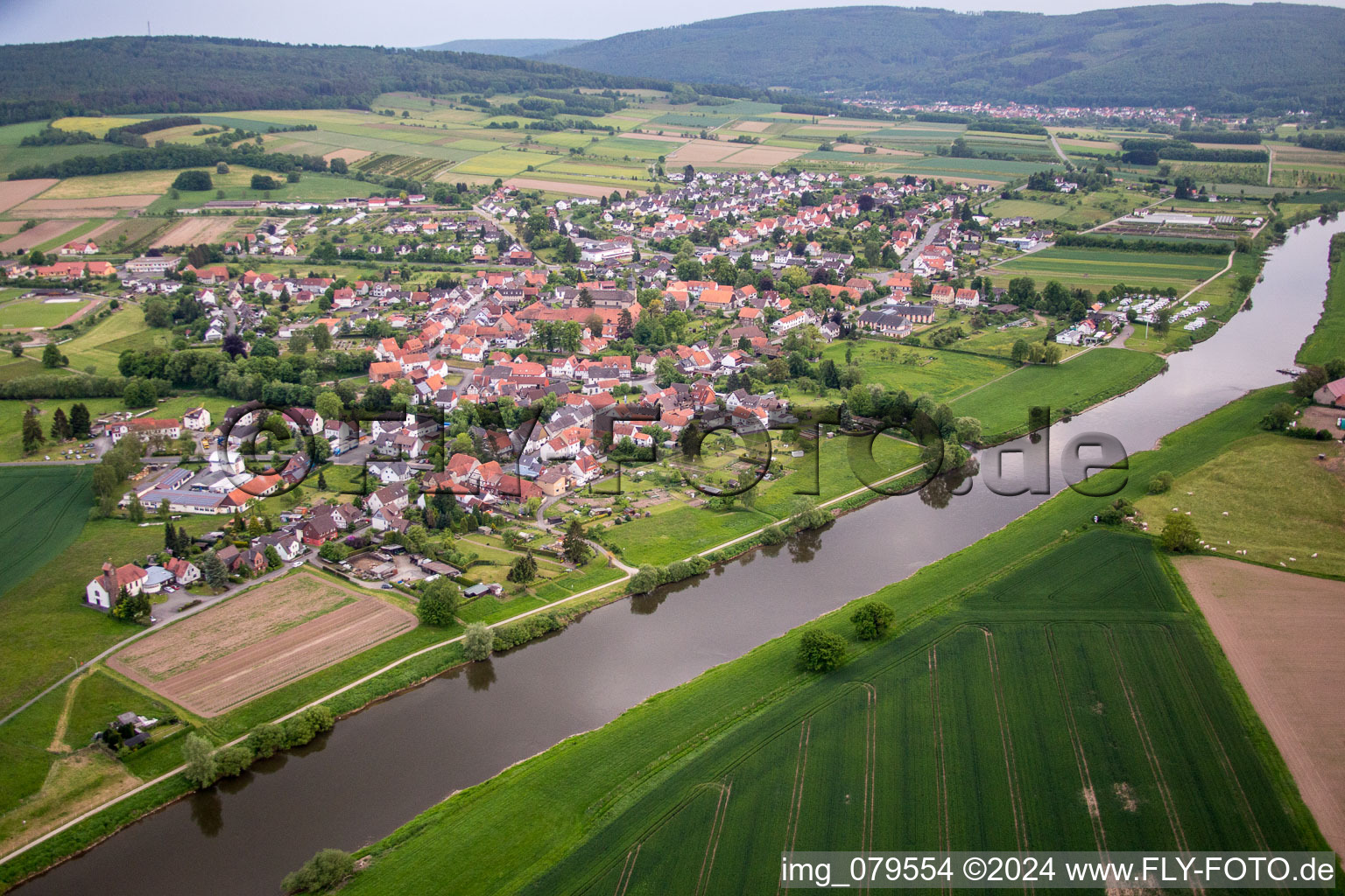 Village on the river bank areas of the Weser river in Wahlsburg in the state Hesse, Germany