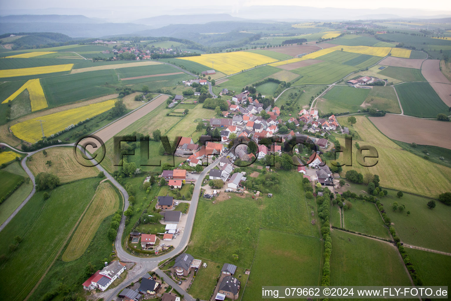 Village - view on the edge of agricultural fields and farmland in Bad Pyrmont in the state Lower Saxony, Germany