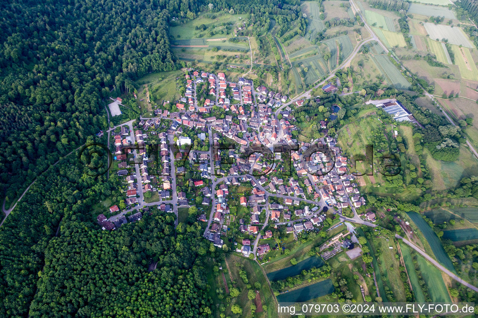 Village - view on the edge of agricultural fields and farmland in Sulzbach in the state Baden-Wurttemberg, Germany