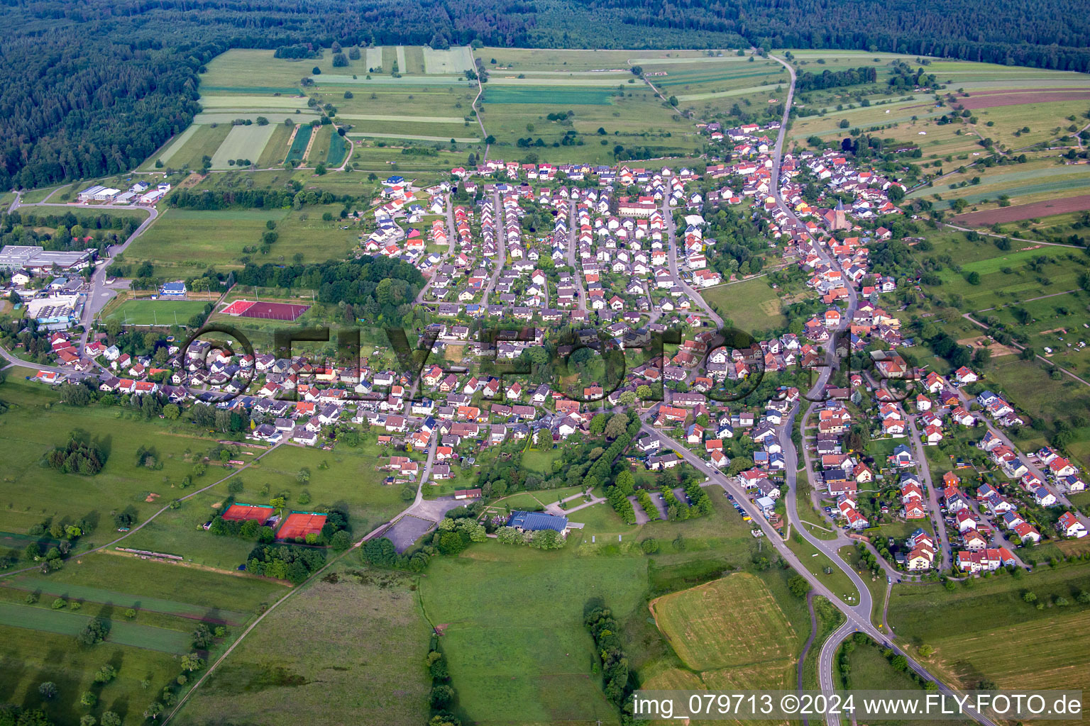 Aerial view of Village - view on the edge of agricultural fields and farmland in Voelkersbach in the state Baden-Wurttemberg, Germany