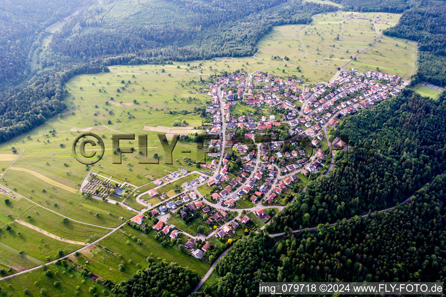 Village - view on the edge of agricultural fields and farmland in Schielberg in the state Baden-Wurttemberg, Germany