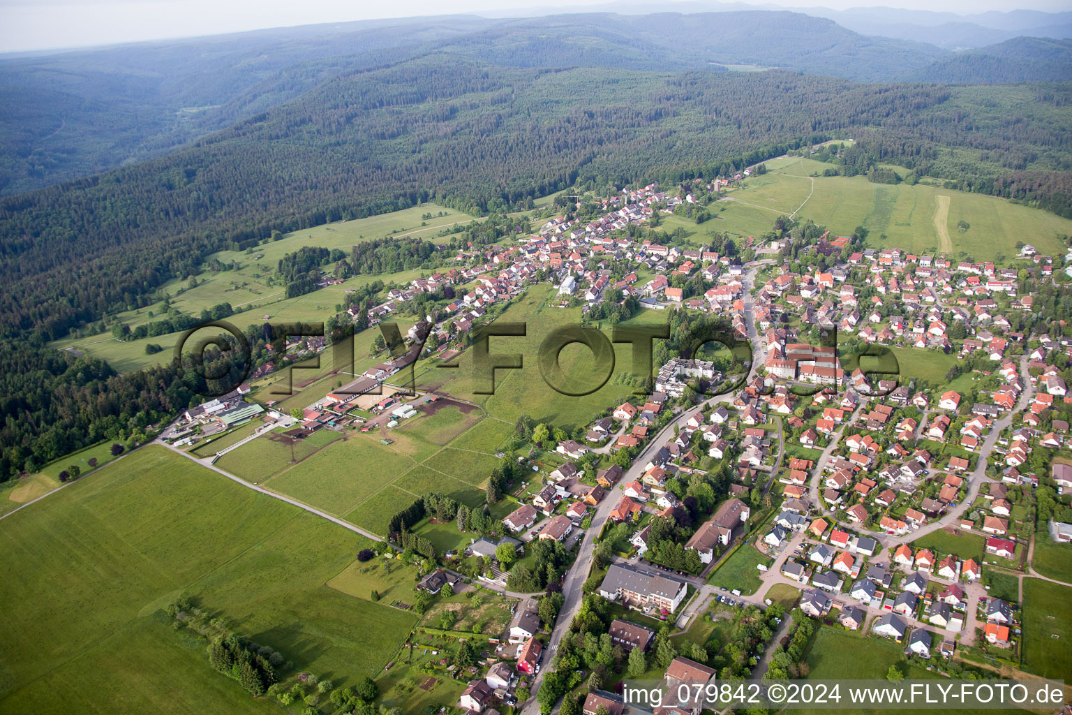 Aerial view of Village - view on the edge of agricultural fields and farmland in Dobel in the state Baden-Wurttemberg