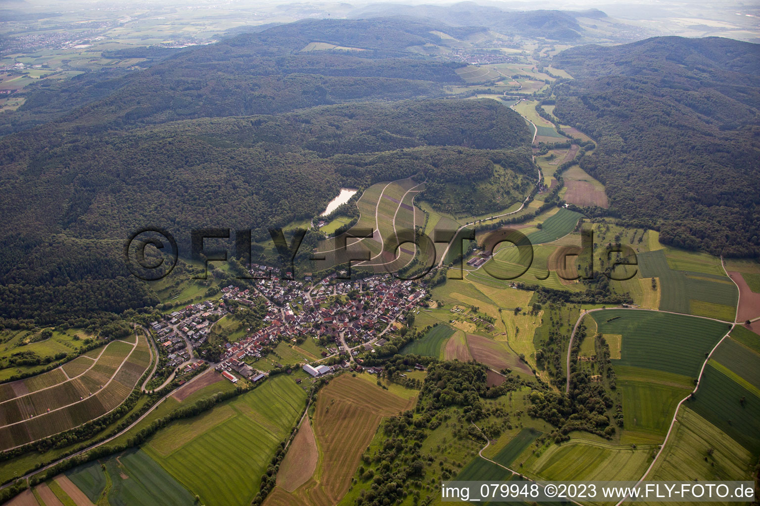 Village - view on the edge of agricultural fields and farmland in the district Haefnerhaslach in Sachsenheim in the state Baden-Wurttemberg, Germany