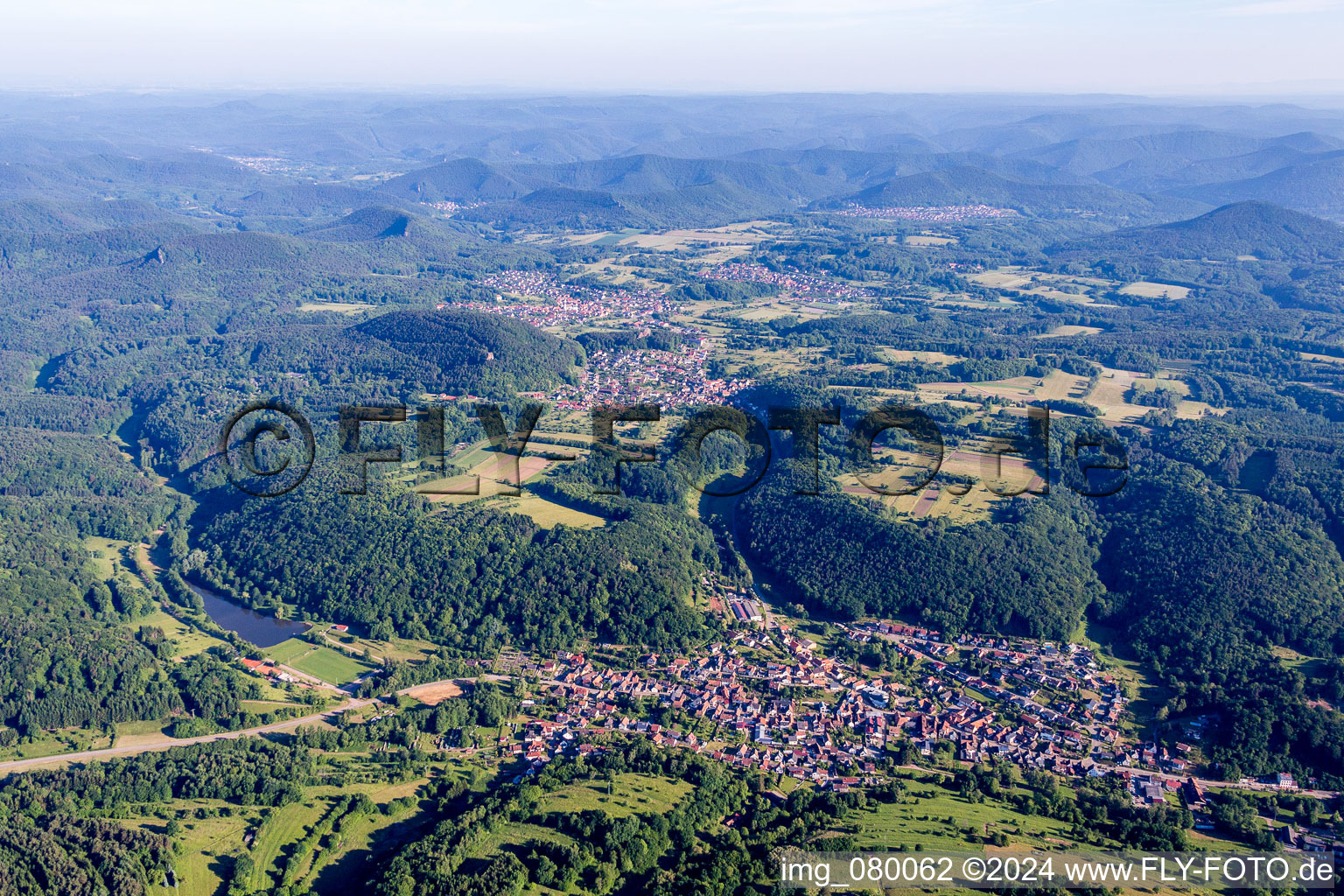 Village - view on the edge of agricultural fields and farmland in Silz in the state Rhineland-Palatinate, Germany