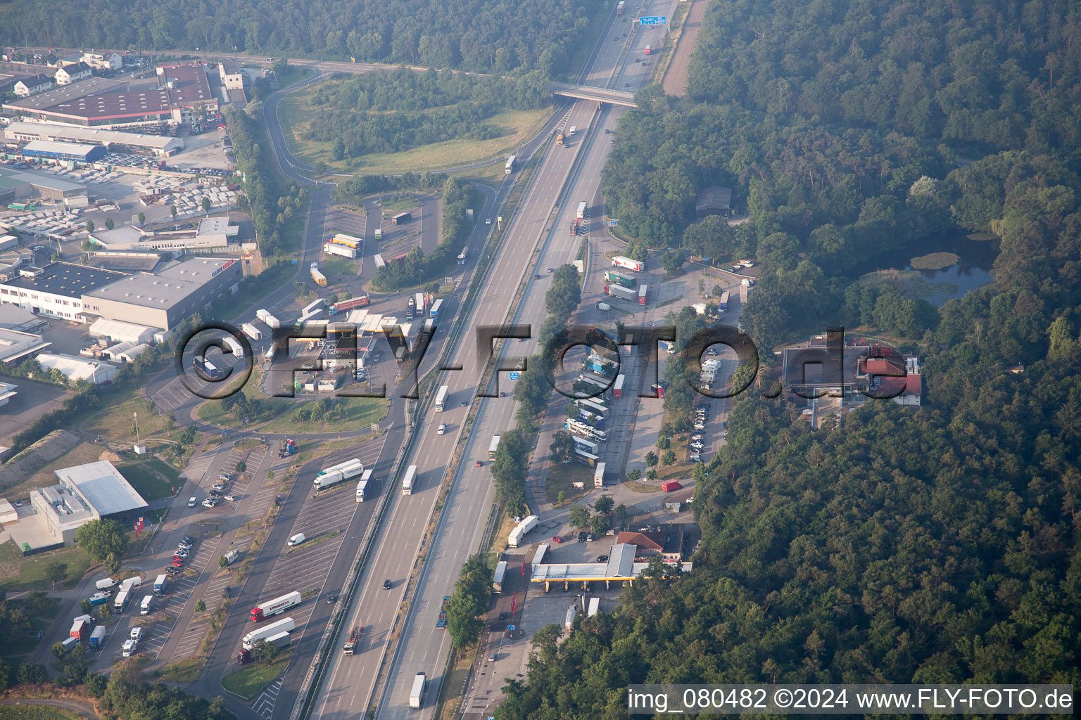 Aerial view of Motorway service area on the edge of the course of BAB highway A5 in Forst in the state Baden-Wurttemberg