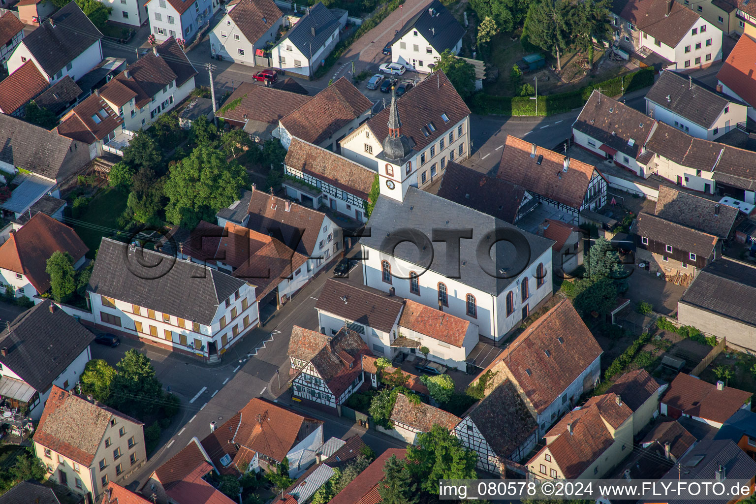 Aerial view of Protestant church in the village center in Westheim in the state Rhineland-Palatinate, Germany