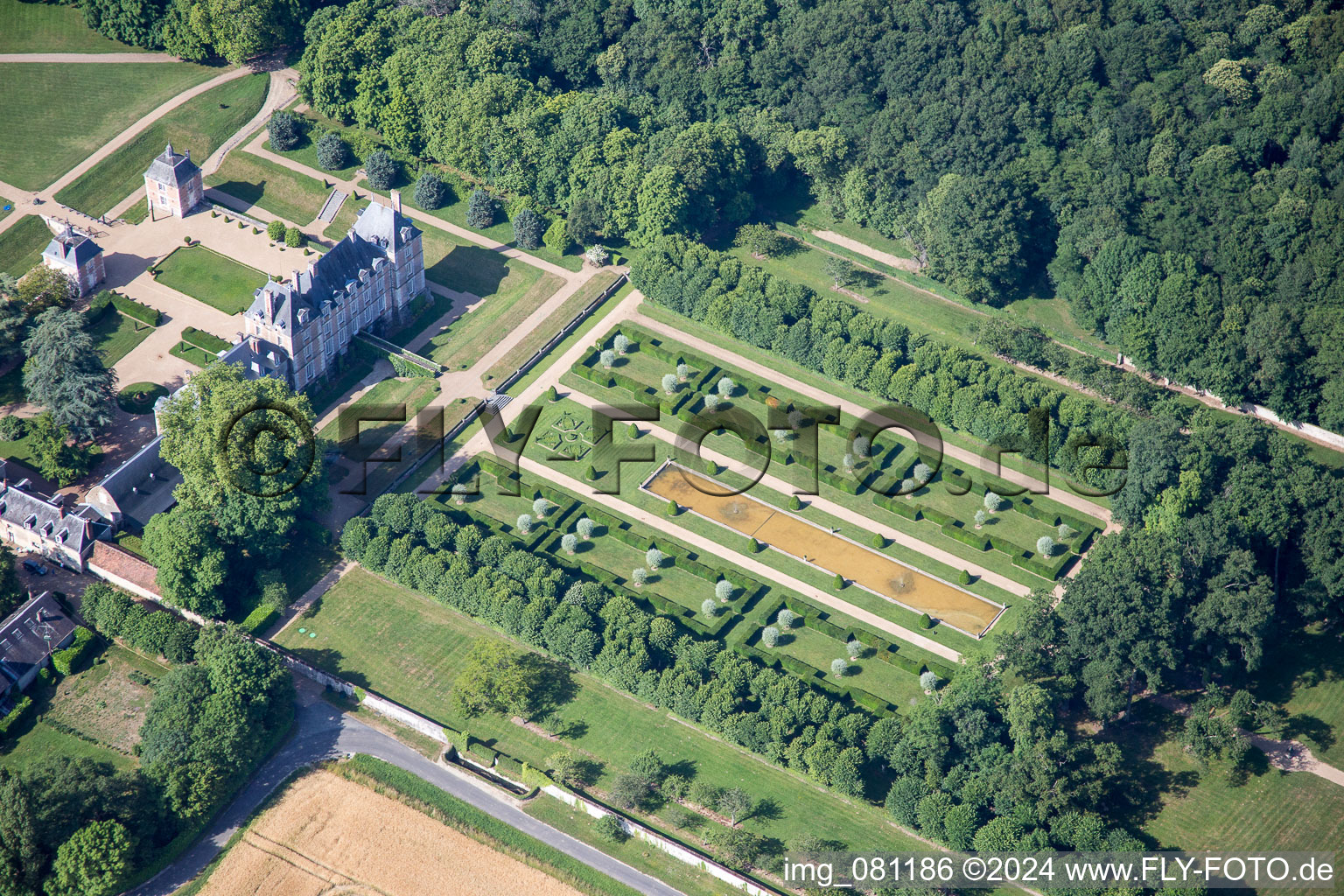 Aerial view of Building complex in the park of the castle La Basse Cour in Huisseau-en-Beauce in Centre-Val de Loire, France