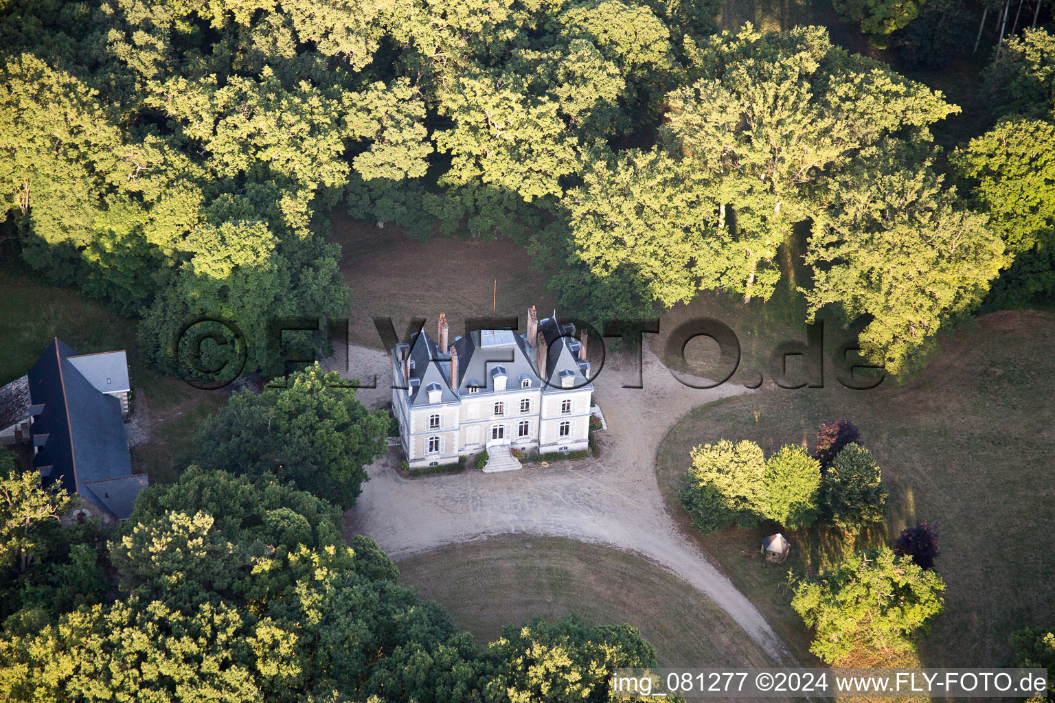 Aerial view of Building complex in the park of the castle Chateau de FougA?res-sur-BiA?vre in FougA?res-sur-BiA?vre in Centre-Val de Loire, France