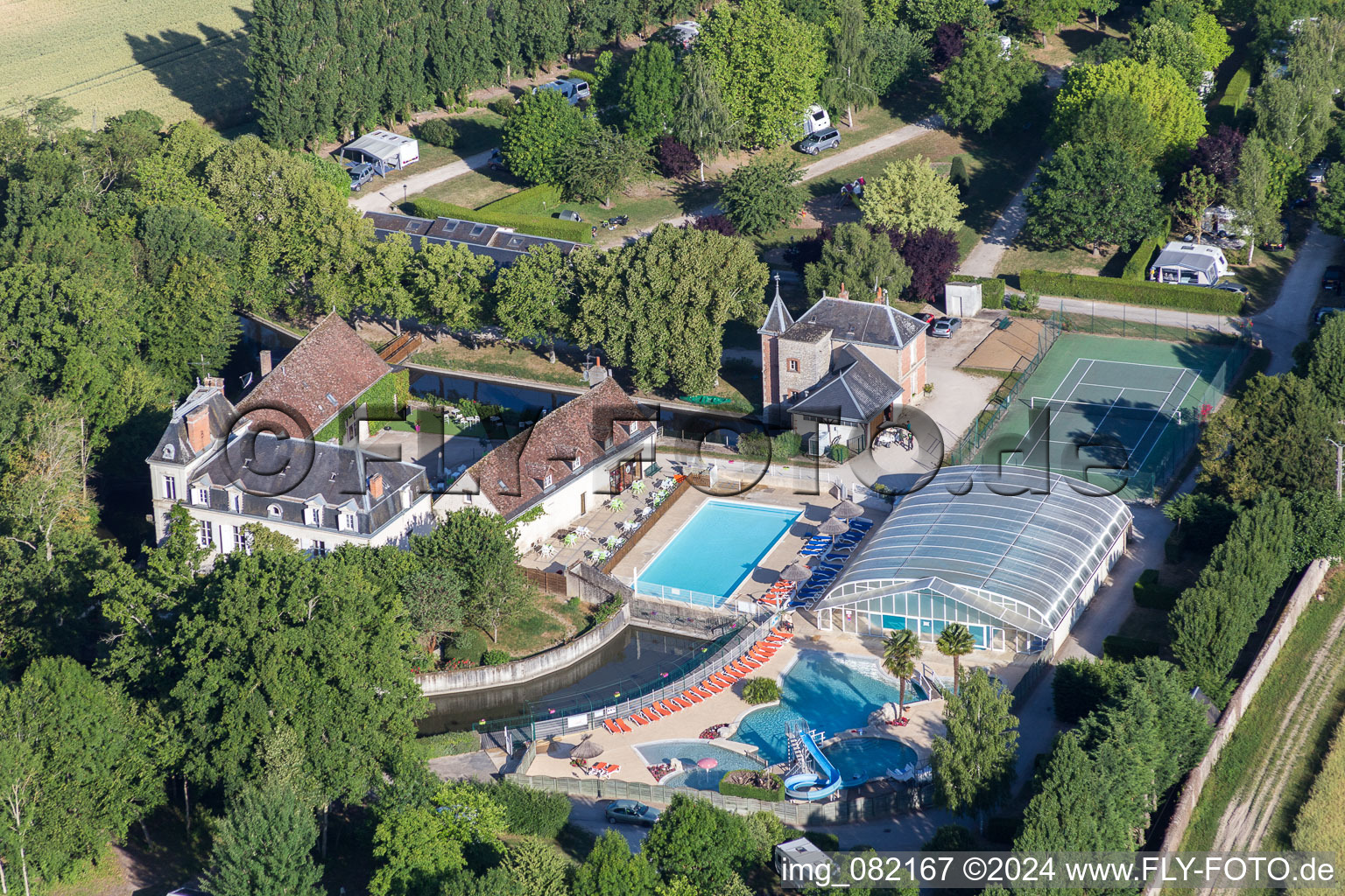 Aerial view of Holiday house plant of the Camping Capfun Chateau de la Grenouillere and Parc de la GrenouillA?re in Suevres in Centre-Val de Loire, France