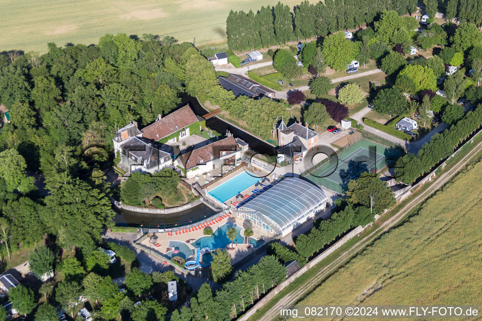 Aerial photograpy of Holiday house plant of the Camping Capfun Chateau de la Grenouillere and Parc de la GrenouillA?re in Suevres in Centre-Val de Loire, France