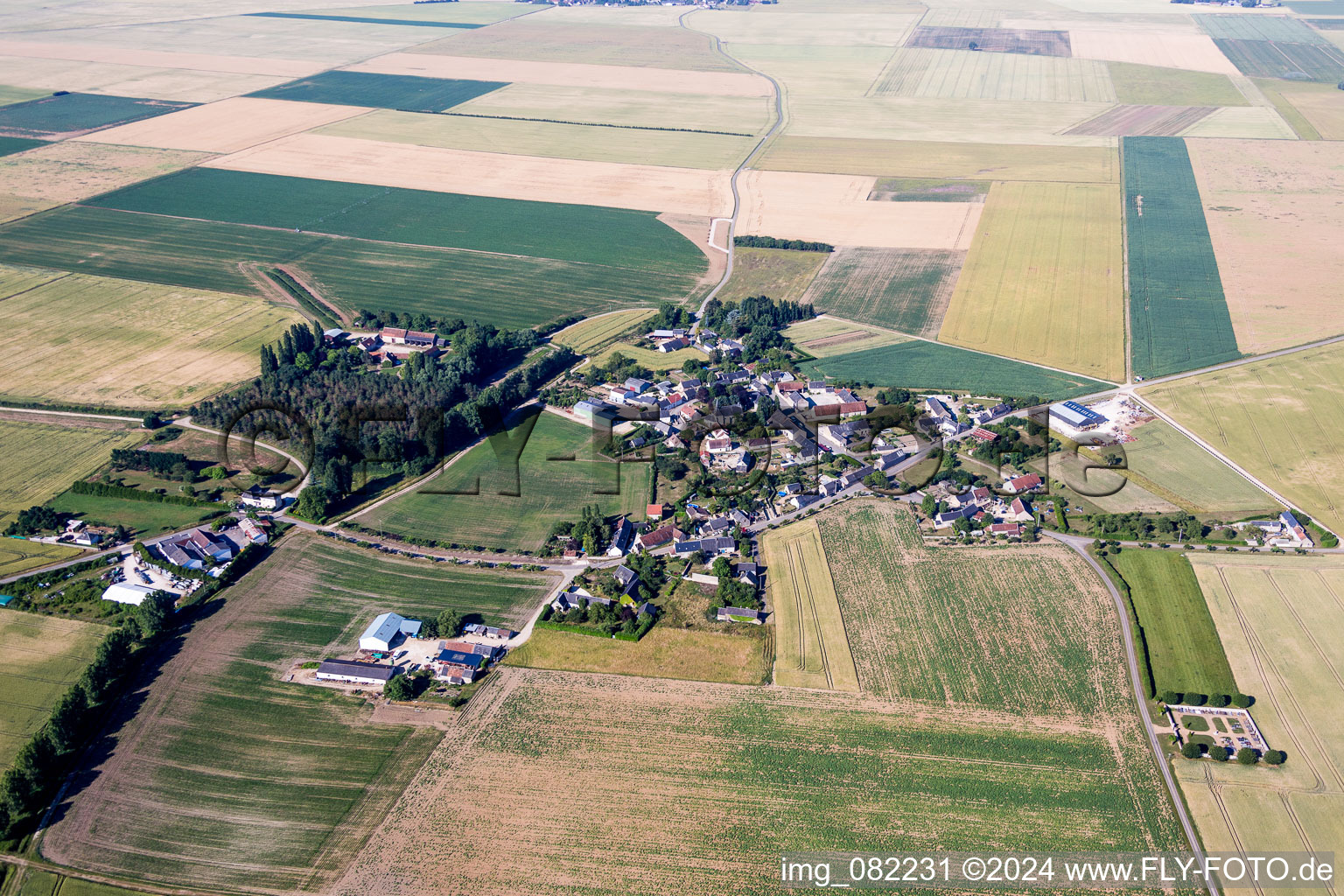 Village - view on the edge of agricultural fields and farmland in Rhodon in Centre-Val de Loire, France