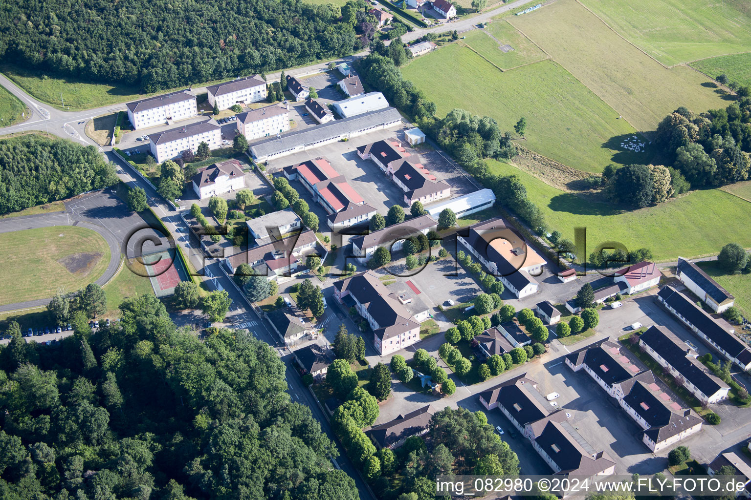 Aerial view of Building complex of the French army - military barracks Camp Drachenbronn in Drachenbronn-Birlenbach in Grand Est, France