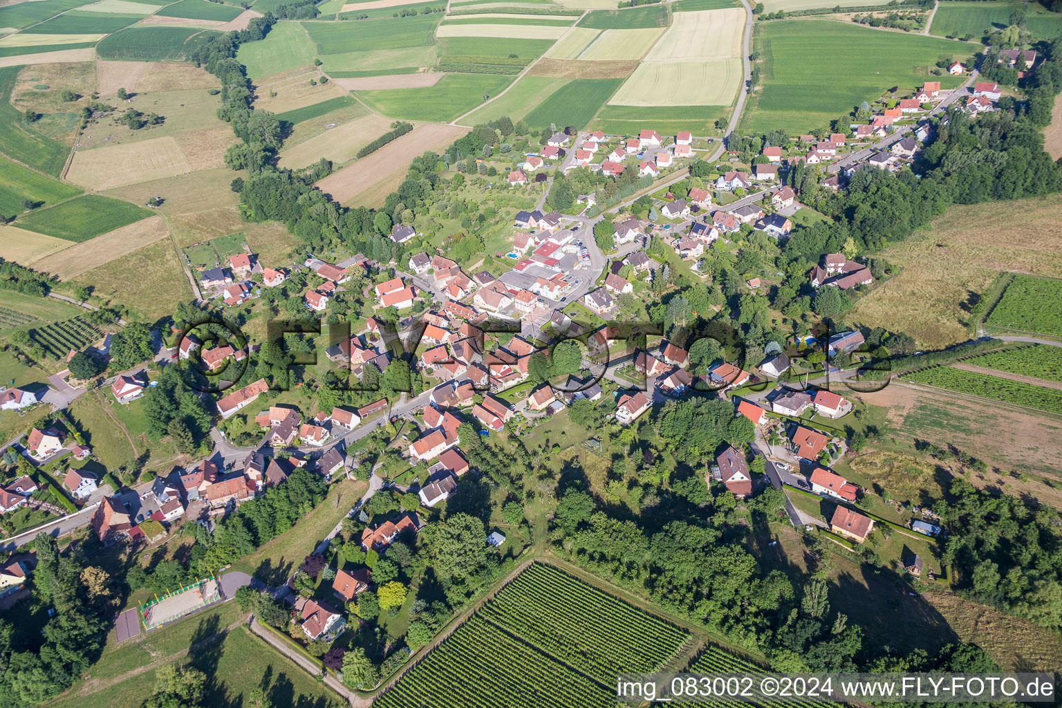 Village - view on the edge of agricultural fields and farmland in Oberhoffen-lA?s-Wissembourg in Grand Est, France