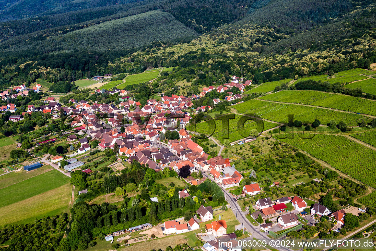 Aerial view of Village - view on the edge of agricultural fields and farmland in Rott in Grand Est, France