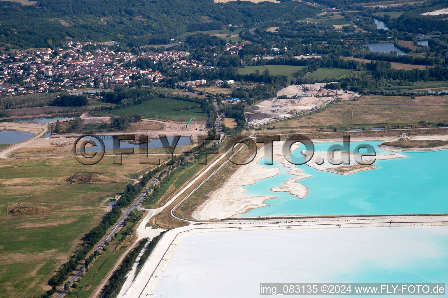 Aerial view of Brown - white salt pans for salt extraction in RosiA?res-aux-Salines in Alsace-Champagne-Ardenne-Lorraine, France