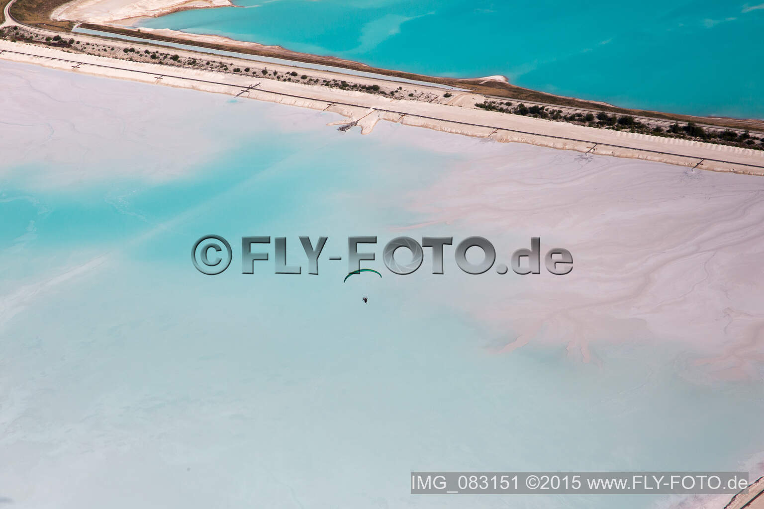 Bird's eye view of Brown - white salt pans for salt extraction in RosiA?res-aux-Salines in Alsace-Champagne-Ardenne-Lorraine, France