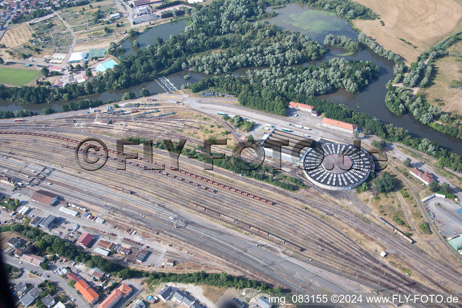 Aerial view of Railway depot and repair shop for maintenance and repair of trains of the SNCF in DameleviA?res in Grand Est, France