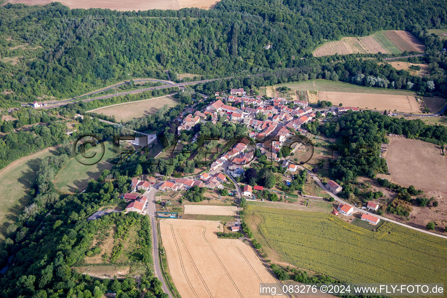 Aerial view of Village - view on the edge of agricultural fields and farmland in Jaulny in Grand Est, France