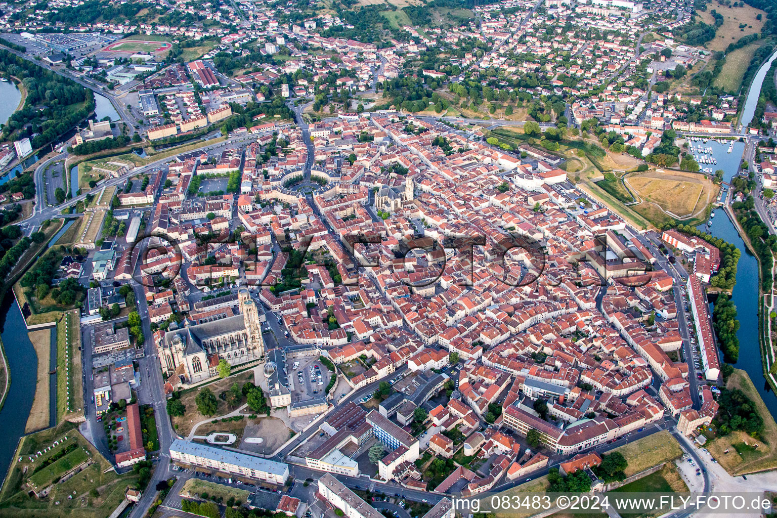 City center in the downtown area on the banks of river course Mosel in Toul in Grand Est, France