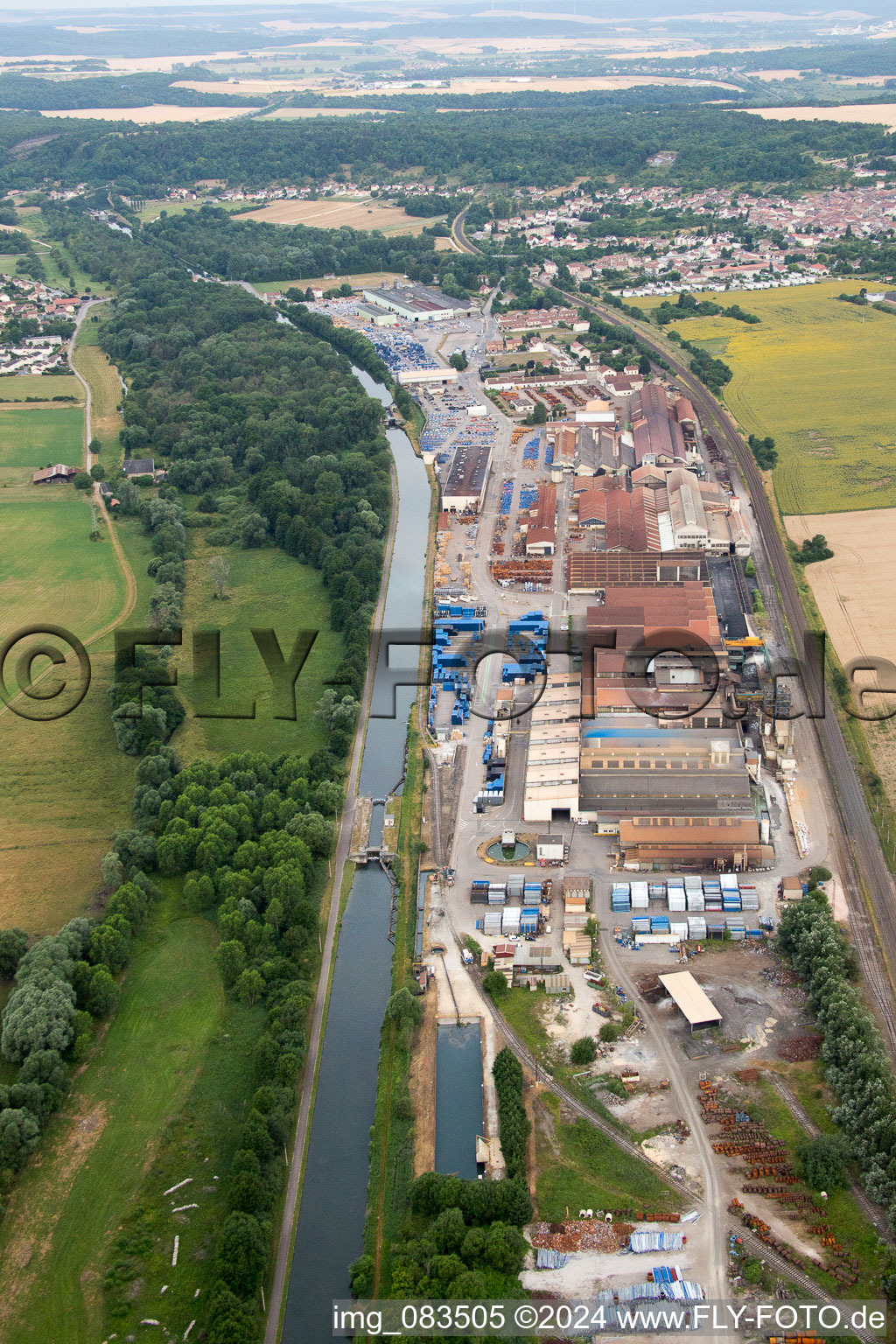 Aerial view of Building and production halls on the premises of Foundery Saint Gobain PAM on Canal de la Marne au Rhin in Foug in Grand Est, France