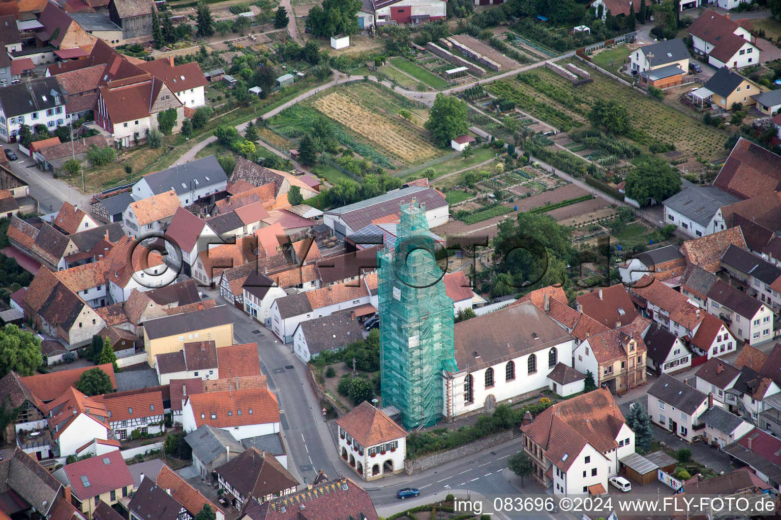 Catholic church scaffolded by Leidner GmbH Gerüstbau, Landau in the district Ottersheim in Ottersheim bei Landau in the state Rhineland-Palatinate, Germany from above